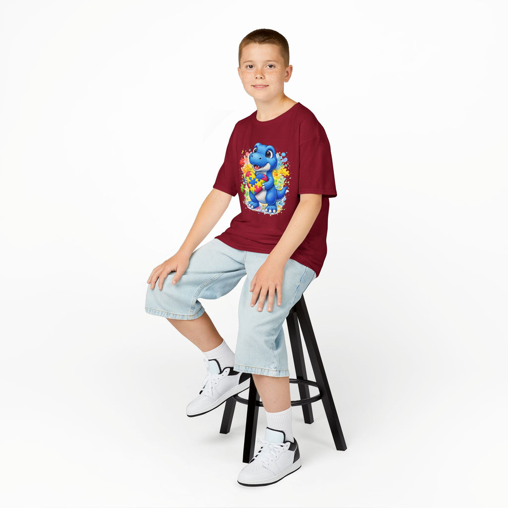 Kids T‑Shirt — Cute Blue Dinosaur Holding Puzzle Heart (Autism Awareness)