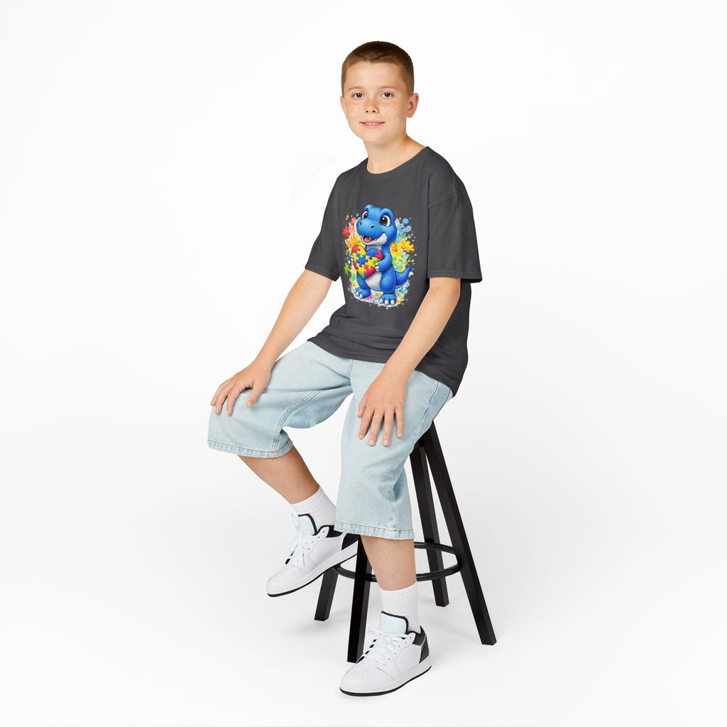 Kids T‑Shirt — Cute Blue Dinosaur Holding Puzzle Heart (Autism Awareness)