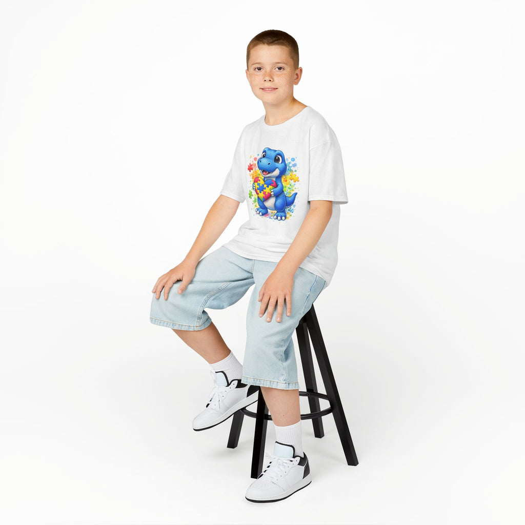 Kids T‑Shirt — Cute Blue Dinosaur Holding Puzzle Heart (Autism Awareness)