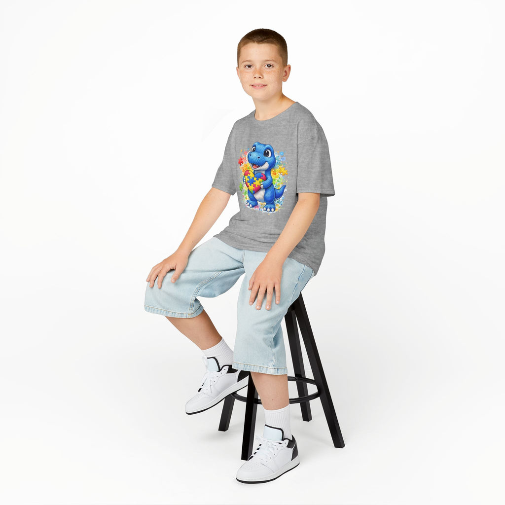 Kids T‑Shirt — Cute Blue Dinosaur Holding Puzzle Heart (Autism Awareness)